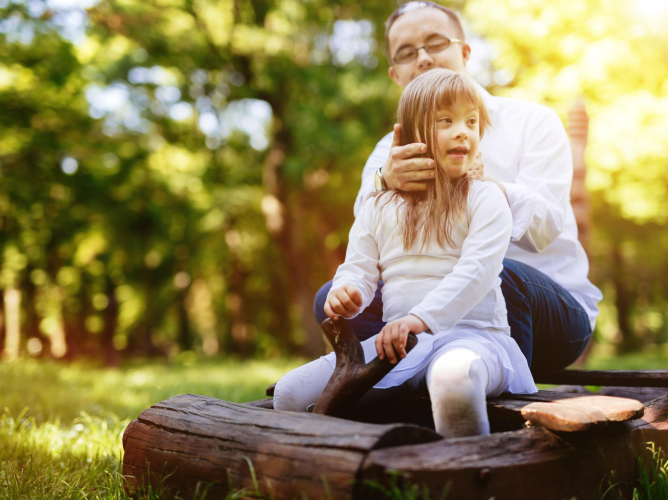 People with down syndrom caring for each other People with down syndrom caring for each other and happy together